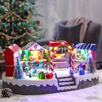 Décor de village de Noël avec bâtiments illuminés, enfants patineurs, plusieurs chants classiques, décoration de table festive pour l'ambiance de la maison de vacances, décor de Noël