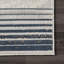 Tapis beige à motif géométrique abstrait Govea-577649848