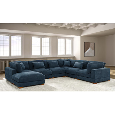 Arliz 7 - Piece 144" Wide Reversible Modular Corner Sectional with Ottoman
