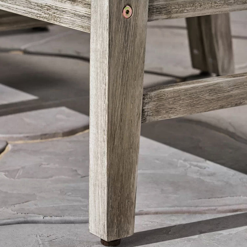 Fauteuil d'angle gris foncé en bois avec coussins et siège de piscine