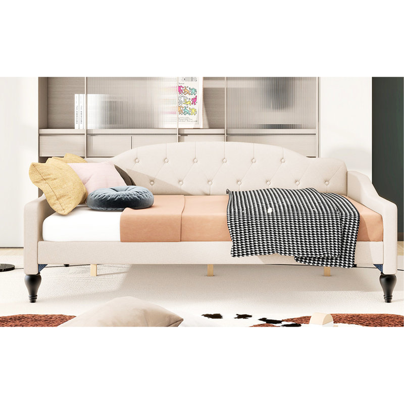 Lit de jour beige avec rembourrage en mousse et capitonnage à boutons profonds - construction moderne - pieds