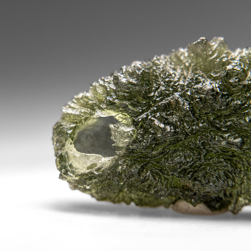 Genuine Moldavite Tektite (18.8 grams), 0.5" H x 1" W x 1.75" D