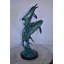 Statue de trois dauphins sautant sur l'océan en bronze 12 po x 12 po x H 25 po.