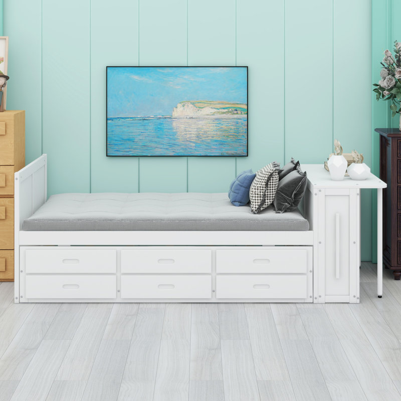 Lit plateforme multifonctionnel en bois avec bureau, tablette de rangement au bout du lit, lit gigogne intégré et tiroirs