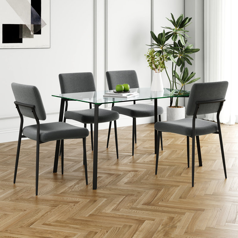 This Five-piece Set Includes A Modern Tempered Glass Table And Four Chairs For A Four-person Square Glass Dining Room, As Well As A Tiny Kitchen Table And Chairs That Are Ideal For Small Rooms Or Apartments.