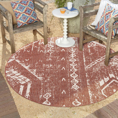 Tapis intérieur / extérieur rouge rouille en polypropylène tissé à la machine 9 pi 10 po x 13 pi Loreen