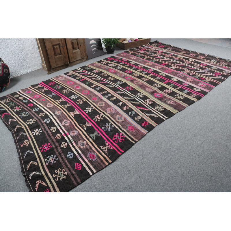 Vintage Turkish Black Kilim Rug Offers a Bohemian Touch with Handmade Patterns and Details