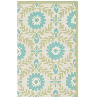 Tapis floral bleu / crème