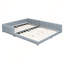 Grand lit plateforme tapissier en similicuir