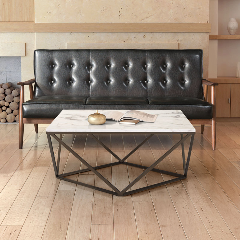 Table basse blanche et bronze antique