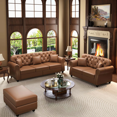 Canapé brun Chesterfield
