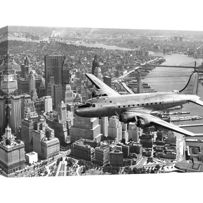Flying Over Manhattan, NYC by Anonymous - Wrapped Canvas Print