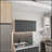 Brookeline Rectangle 2-Door Wall Cabinet with Spacious Storage and Sleek Smokey Oak Finish, Perfect for Modern Living Spaces.