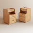 Two 40-inch solid wood nightstands with beveled tabletop design, equipped with cable holes