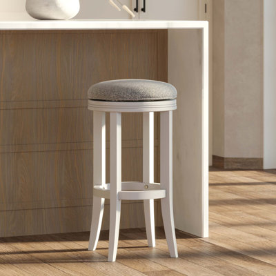 Tabouret pivotant à hauteur de bar avec pieds en bois et siège rembourré