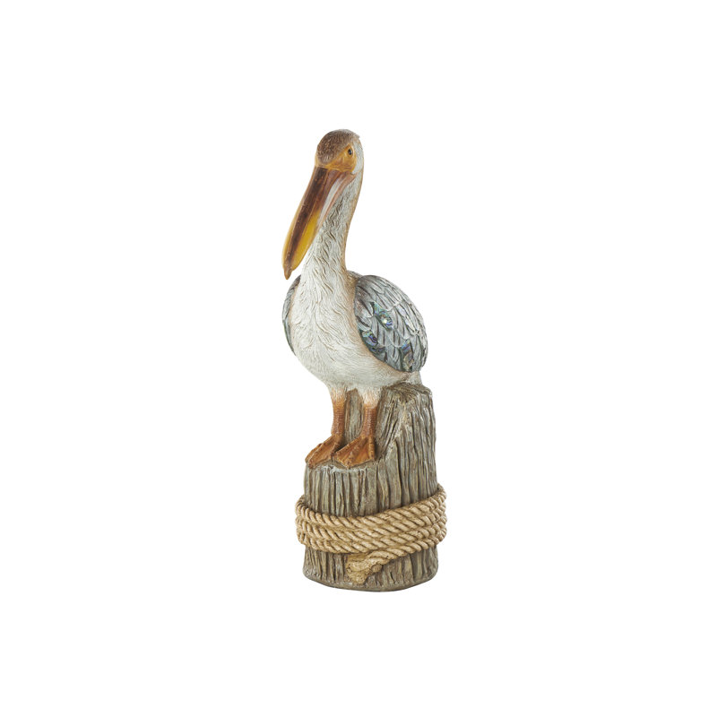 Cole And Grey Resin Textured Pelican Sculpture With Brown Block And Shiny Accents