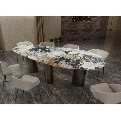 Table de salle à manger de luxe en pierre avec base en acier inoxydable - Conception ovale moderne pour les espaces contemporains