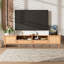 Console multimédia moderne avec rangement spacieux et pieds en bois