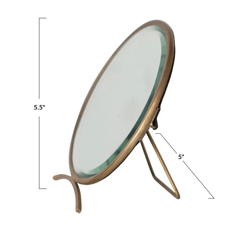 Miroir rond en laiton sur support au fini antique