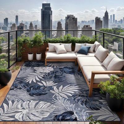 Chartier Machine Woven Floral Area Rug