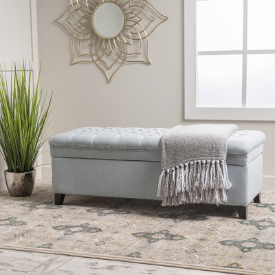 Repose-pieds de rangement polyvalent avec des sièges confortables et beaucoup d'espace, parfait pour la vie moderne et l'organisation.