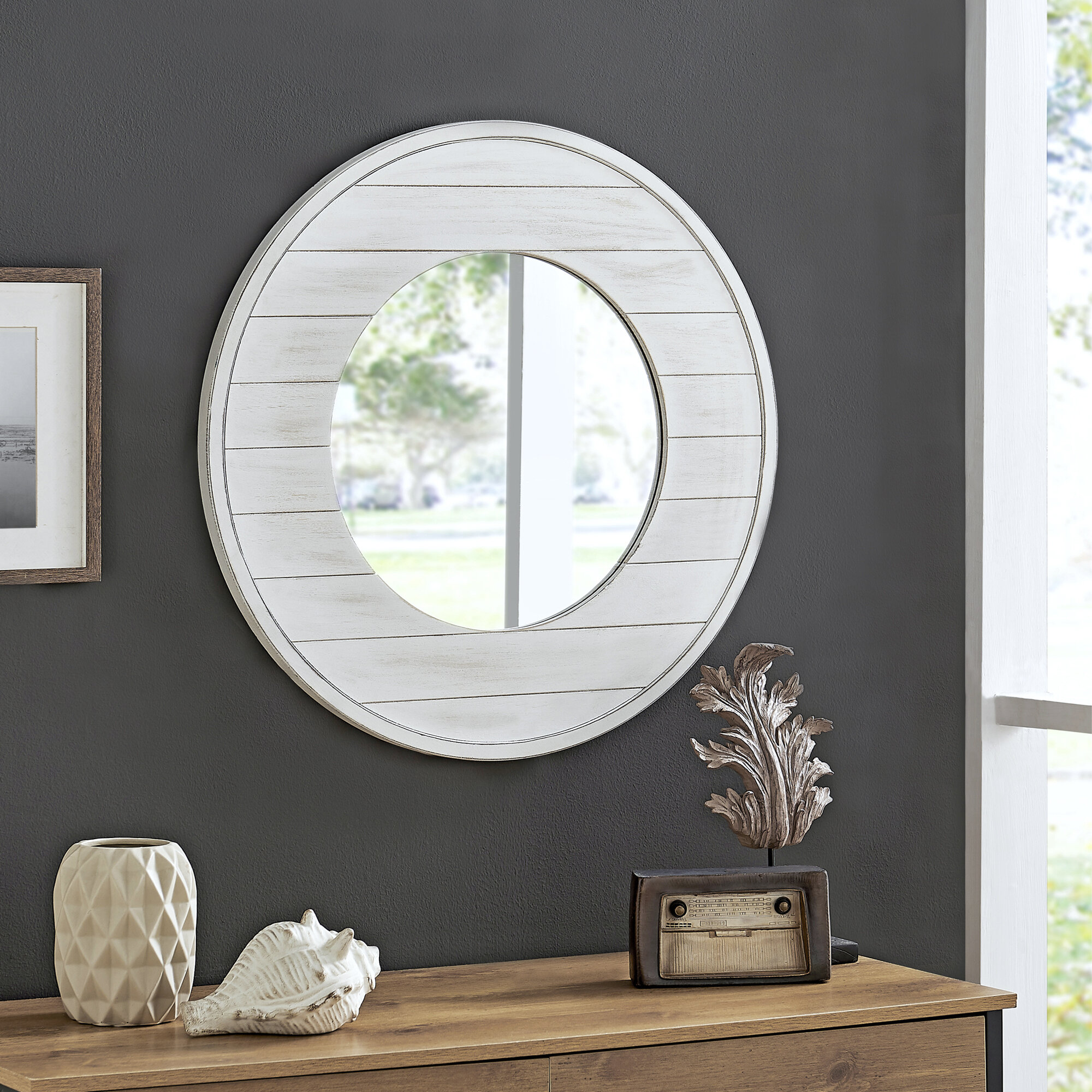 https://assets.wfcdn.com/im/07343053/compr-r85/1805/180533867/tolan-round-wood-wall-mirror.jpg