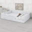 Lit simple rembourré pour petites chambres-1077458255