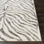 Prina Animal Print Area Rug-1551130427