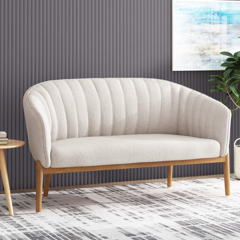 Beige avec surpiqûres en canaux et pieds en bois d'hévéa brun, look Mid-Century moderne, tissu d'assemblage, coutures, requis