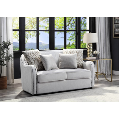 Lin beige avec 4 coussins, siège à ressorts ensachés, structure intérieure en bois, pieds Kd, dossier en plastique serré et coussin amovible, housse de coussin amovible, garniture cloutée, densité de mousse D25, 7 po