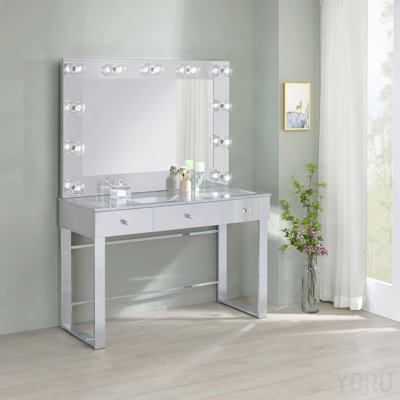 Coiffeuse chromée à 3 tiroirs avec miroir