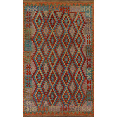Tapis orange / rouille géométrique en laine tissé à plat à la main et rectangulaire 6 pi 7 po x 9 pi 7 po