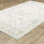 Tapis floral en laine et viscose tissé à la main Eiligio-1077678870