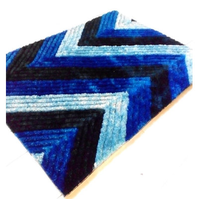 Tapis bleu foncé en laine tissé à la machine