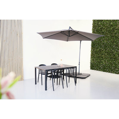 Kirilka 4 - Person Patio Dining Set with Rectangular Table