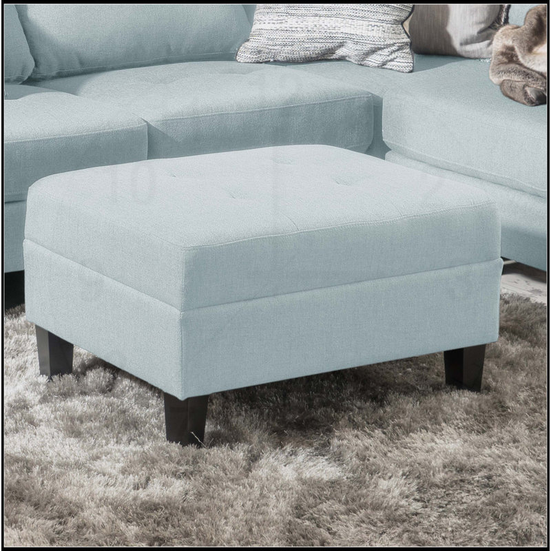 Repose-pieds classique en bois de bouleau avec rembourrage en mousse de haute qualité et tissu durable, parfait pour le confort et le style.