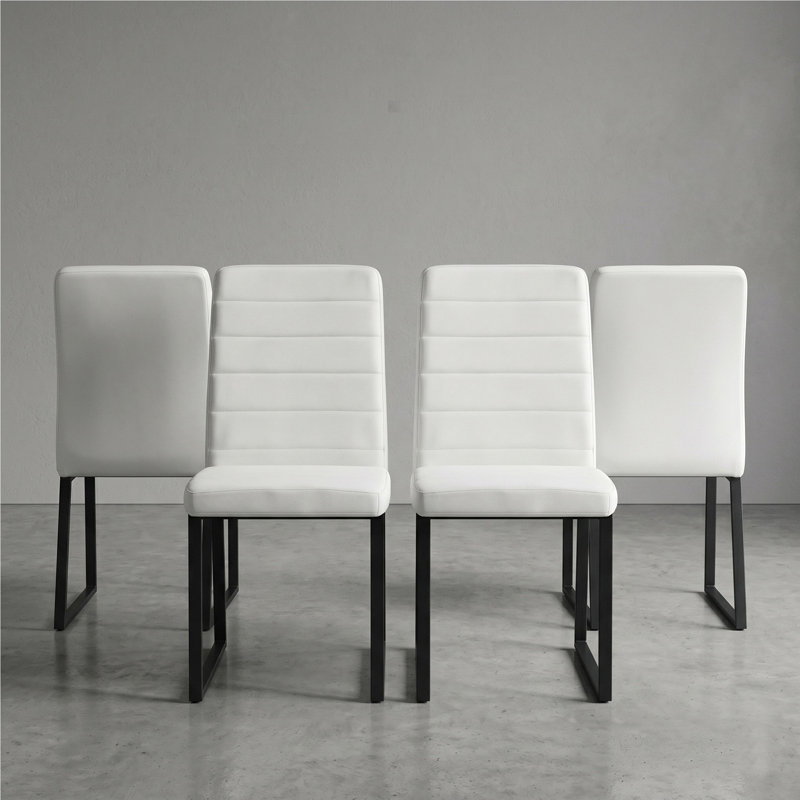 Ensemble de 4 chaises de bureau / salle à manger en polyuréthane de première qualité avec mousse haute densité, pieds en fer robuste (peinture en aérosol) et plusieurs couleurs. Assemblage facile