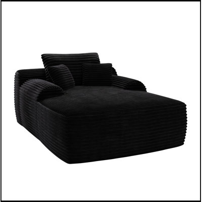 Chaise longue avec accoudoirs larges et coussins décoratifs