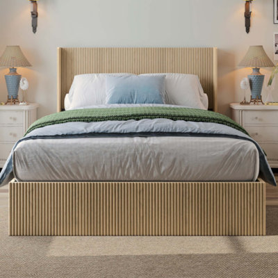 A large raised and undulating storage bed frame with grooves. The wooden platform bed frame has a storage function that can be lifted, without requiring a spring box / no noise