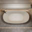Baignoire de trempage autoportante à surface solide de 61 po x 30,7 po avec trop-plein et bonde escamotable