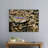 Closeup of Reticulated Python Head between Rocks and Wood Pieces-66115900