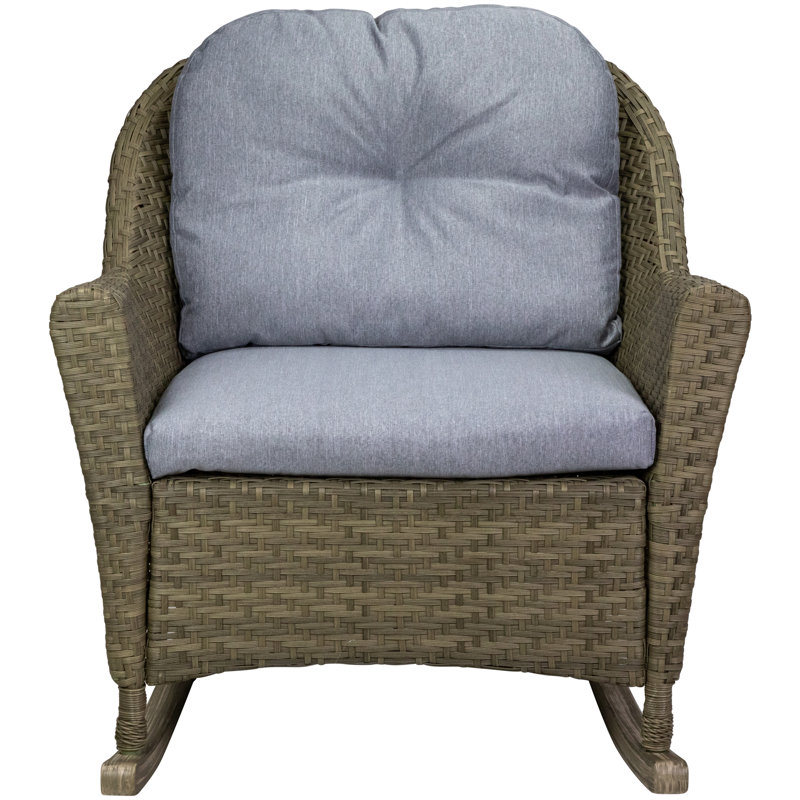 Chaise berçante d'extérieur en osier avec coussins
