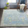 Tapis bleu à motif floral Berger