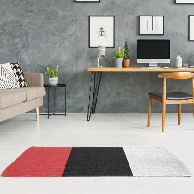 Tapis de zone rouge/noir