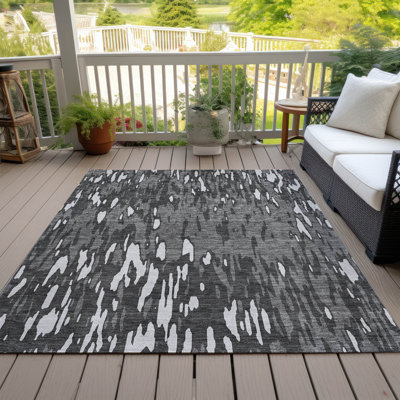 Tapis rectangulaire Aleighna avec envers antidérapant