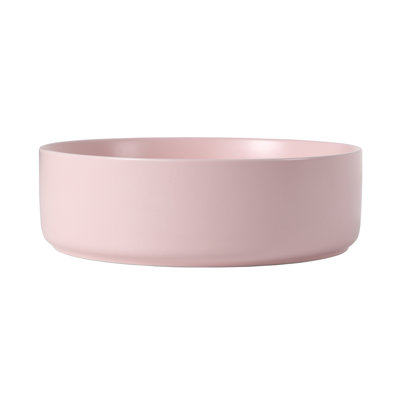 Élégant lavabo de comptoir en céramique avec une conception de haute qualité résistante aux taches et facile à nettoyer, convenant aux salles de bain et aux salles de bain.