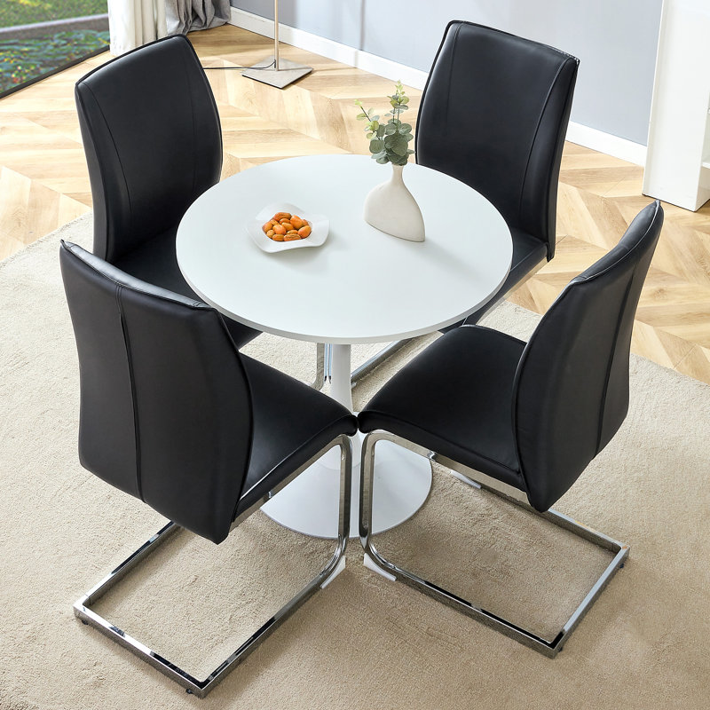  Ensemble de 5 petites tables de salle à manger rondes avec chaises rembourrées en polyuréthane et pieds arqués argentés, noir