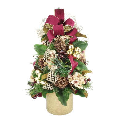 Holiday Tree with Hydrangeas and Ribbons in Fiberstone Pot