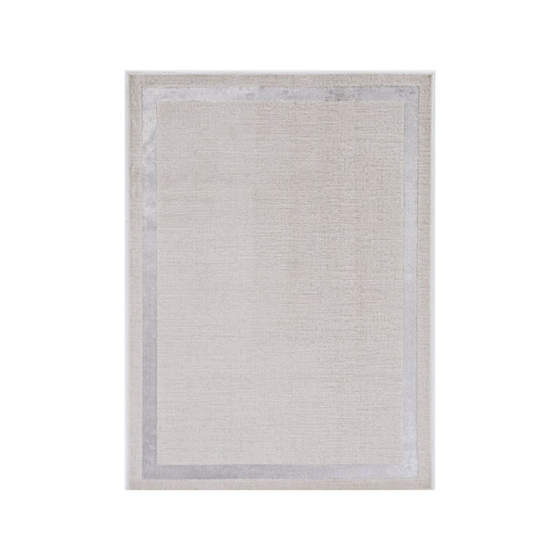 Tapis géométrique beige touffeté