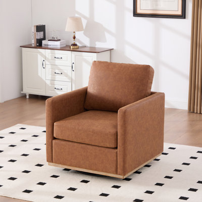 Fauteuil large pivotant rembourré
